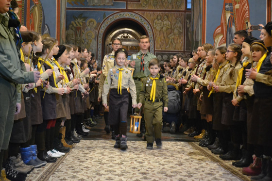 Members of Plast, the National scout organization of Ukraine, bring Peace Light of Bethlehem to Mykhailivskyi cathedral which is the main cathedral of the independent Ukrainian Orthodox church that was created in 2018.
