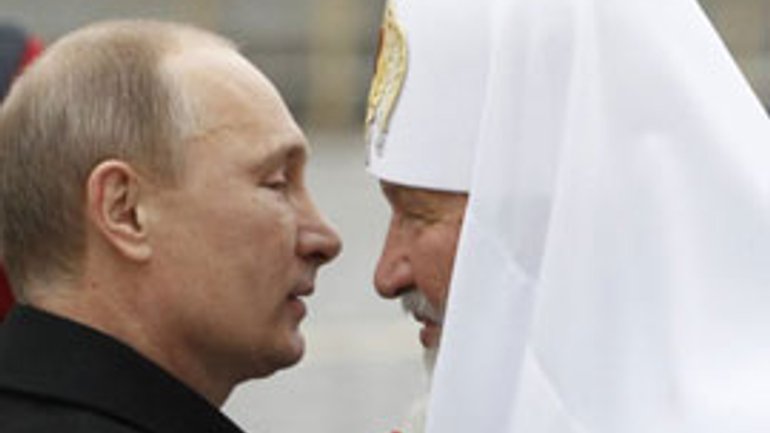Путін упізнав у батьку Патріарха Кирила священика, що його хрестив - фото 1
