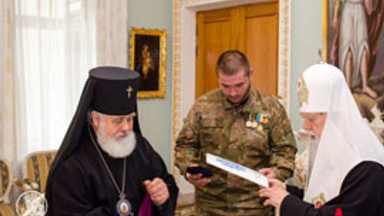 Патріарх Філарет нагородив церковними орденами бійців Української добровольчої армії - фото 1